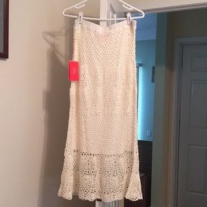 Brand New E T C beige long netting skirt. Size L